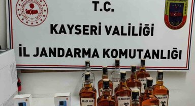 Restoranda bandrolsüz içki ve kaçak telefon ele geçirildi