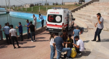İki kardeş suni gölette boğulma tehlikesi geçirdi,