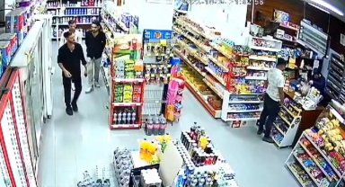 Raftaki şampuanları pantolonlarına sokarak çaldılar