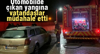 Otomobilde çıkan yangına vatandaşlar müdahale etti