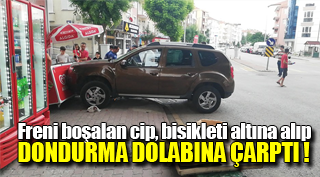 Freni boşalan cip, bisikleti altına alıp dondurma dolabına çarptı